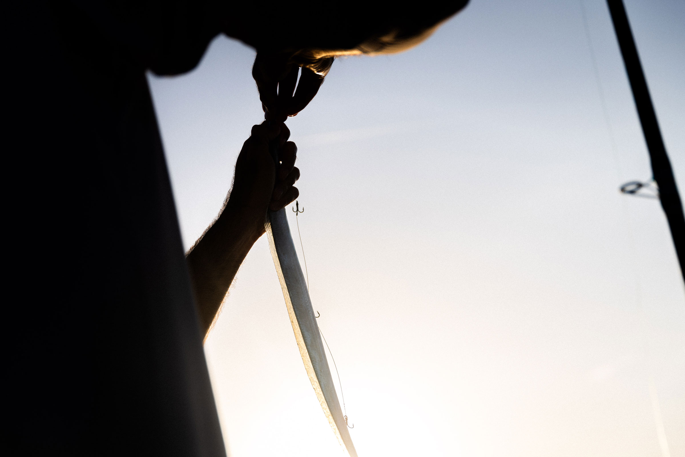 Putting bait on hook